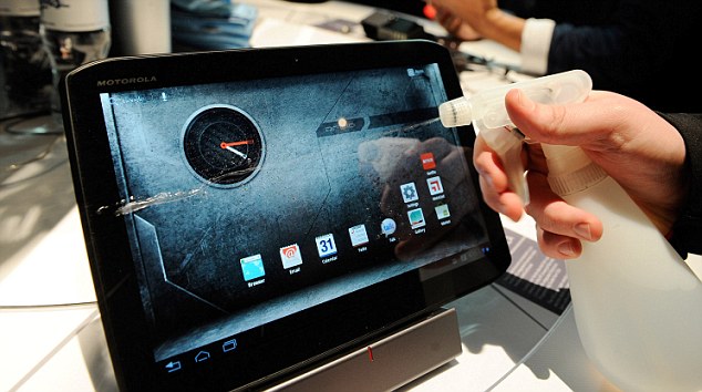 Motorola's Droid Xyboard 10.1 on display at the Motorola booth at the 2012 International Consumer Electronics Show in Las Vegas. The tablet device features a water resistant coating