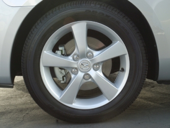 2007 Mazda MAZDA3 i Sport 4-Door Front Wheel Close Up