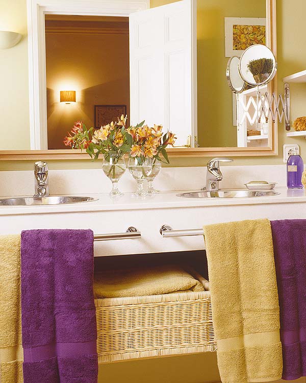 Luxury-purple-and-yellow-washbasin-with-sinks-faucets-and-large-mirror