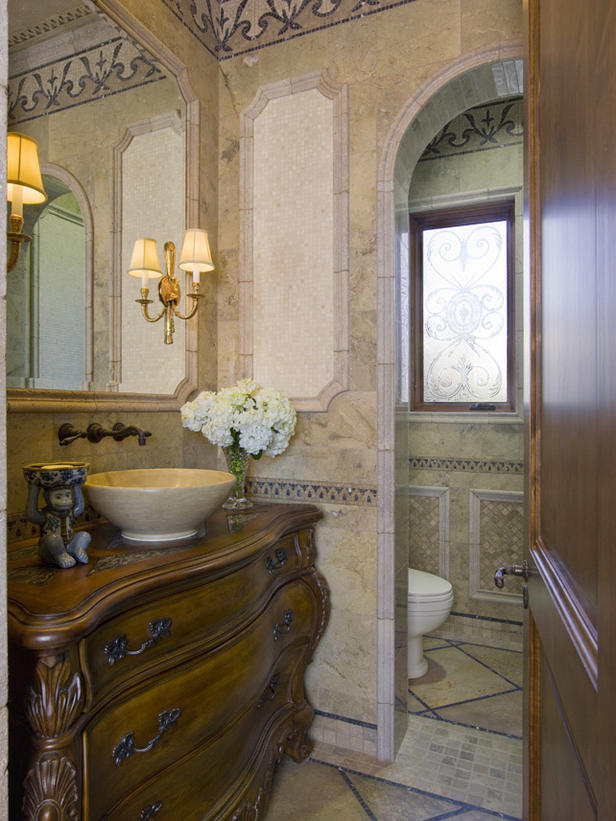 Elegant-bathroom-with-commode-chest-with-a-stone-vessel-as-a-sink-cabinet