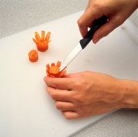Cut out carrot core with a paring knife when making carrot flower garnishes.