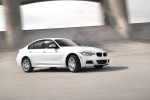 2013-BMW-335i-xDrive-front-three-quarter