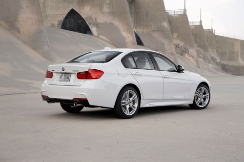 2013-BMW-335i-xDrive-rear-three-quarter-