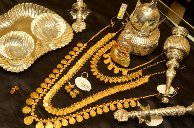 Both the precious metals, gold and silver tumbled in the national capital on Thursday on heavy sell-off by stockists, triggered by a weak trend in overseas markets. File photo