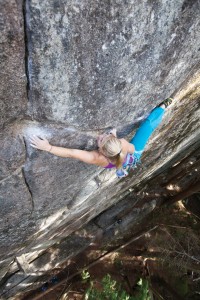 Hazel Findlay stretches for the next hold on Adder Crack, her 5.13c R first ascent in Squamish, BC. Photo by Paul Bride